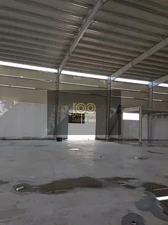Warehouse for rent in Umm Al Thu'ub, suitable for various industrial and storage uses and featur