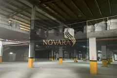 Warehouse for rent in Al Jurf Industrial Area 3, 60,000 sq ft with mezzanine, 750 kW electricity, su