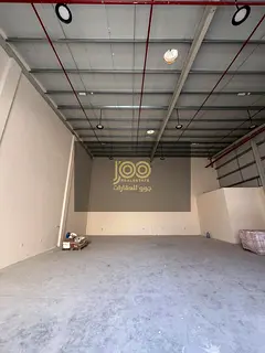 Warehouse for rent in Umm Al Thu'ub, featuring a spacious area suitable for various commercial a