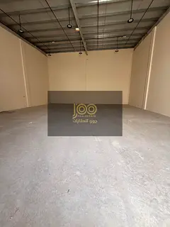 Two adjacent warehouses for rent in Umm Al Thu'ub, offering practical storage space that helps o