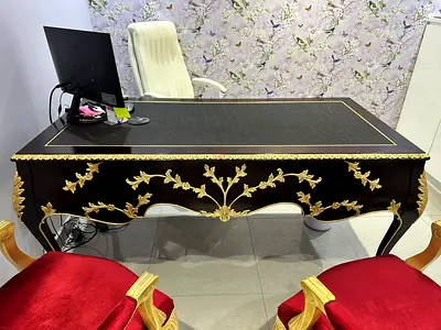 Elegant Vintage Wooden Desk with Ornate Design