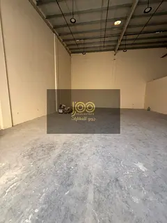 Warehouse for rent in Umm Al Thu'ub, featuring a spacious area suitable for various commercial a