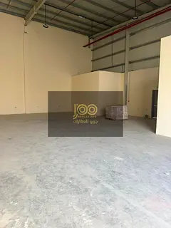 Warehouse for rent in Umm Al Thu'ub, featuring a spacious area suitable for various commercial a