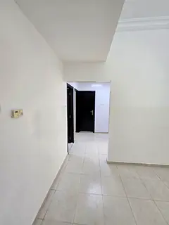 Available for annual rent in Ajman: a two-bedroom apartment with a living room, strategically locate