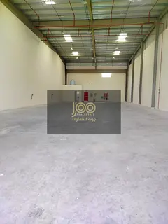 A warehouse for rent in Umm Al Thu'ub, making it suitable for various commercial and industrial 