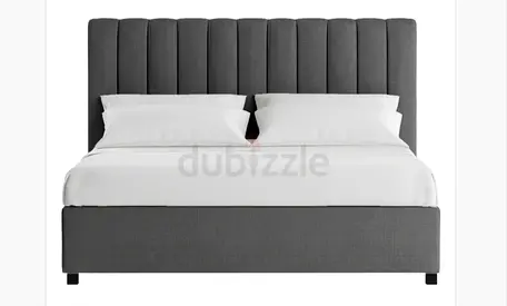 Grey vertical tufting bed with drawer