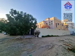 Villa for sale in Al Rawda area, near a mosque. Includes water, electricity, and air conditioning. F
