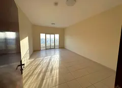 Available for annual rent in Ajman: Two bedrooms and a separate living room with a balcony. Strategi