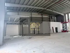 Premium warehouse for annual rent in Umm Al Quwain, 13,000 sq ft with 150 kW power, priced at AED 65