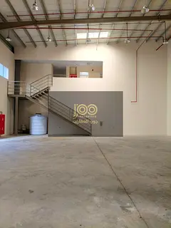 Two warehouses for rent in Umm Al Quwain, in the industrial area. Mezzanine level equipped with offi