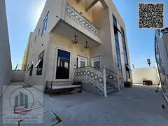 Villa for sale in Ajman, Al Yasmin area. 5 master bedrooms, majlis, 2 living rooms, and a maid's