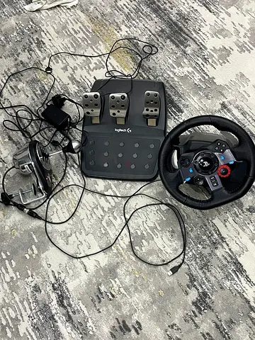 Logitech Racing Wheel and Pedals Set and thrustmaster gear shifter that is in perfect condition