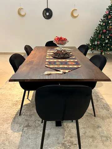 Stylish Dining Table with Elegant Black Chairs