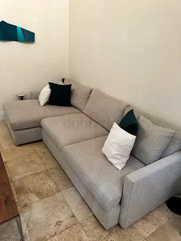 Beige L Shape lounge deep Cratebarrel sofa
