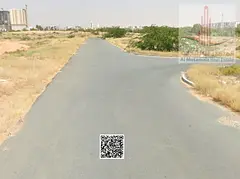 Residential &amp; Commercial Land for Sale in Al Alia Global City Ajman, 400 Sqm Area with G+4 Build