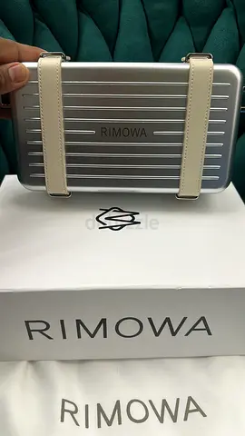 Dior x rimowa clutch