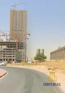 Al-Amrah, Ajman: Residential/commercial land (G+41) with permit for apartment sales. Freehold owners