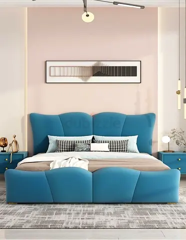Elegant Blue Upholstered Bed with Modern Design