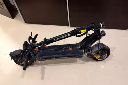 KugooKukirin G2 Pro Max / Master scooter with the original box and catalog.
