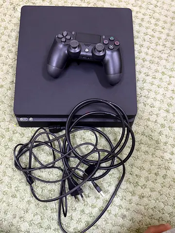 Sony PlayStation 4 Console with Controller and Cables