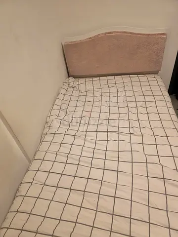 Bed with bedside table from Danube