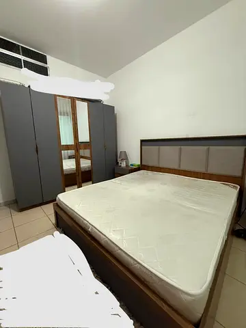 Stylish Bedroom Furniture Set including Bed, Wardrobe, and Mattress