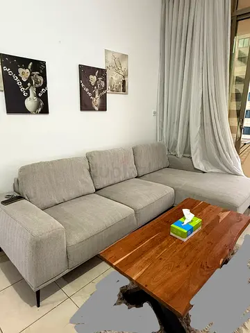 Cozy Grey Sectional Sofa with Stylish Coffee Table