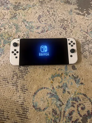 Nintendo Switch OLED in Excellent Condition+ Mario party superstars+ Case