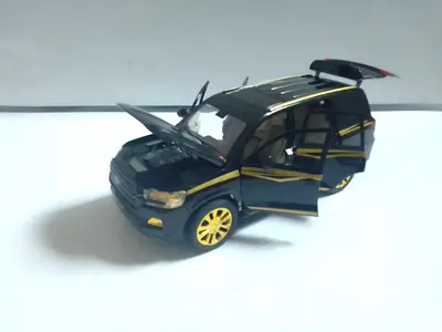 Black and Yellow Toy SUV with Opening 6 Doors