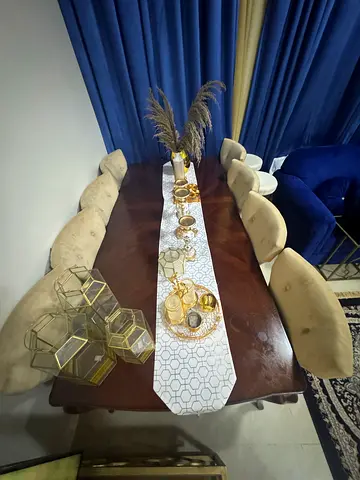 Elegant Dining Table Set with Decorative Centerpiece