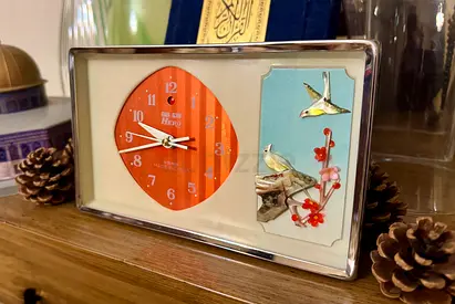 Vintage Decorative Clock with Bird Artwork
