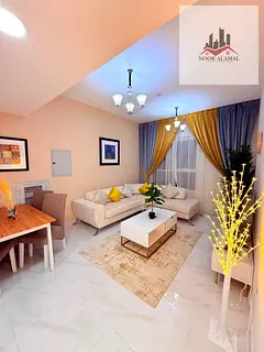 Sharjah, Al Taawun area: One bedroom apartment with living room, kitchen, two bathrooms, and balcony