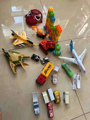 Variety of Action Figures and Toy Vehicles for Sale