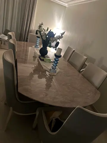 Elegant Oval Dining Table with Stylish Chairs