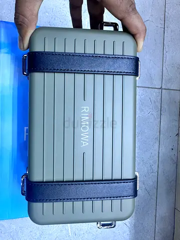 Rimowa + Dior bag