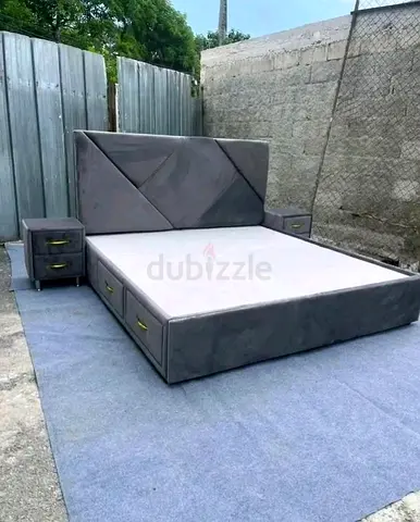 Stylish Grey Upholstered Bed with Storage Drawers