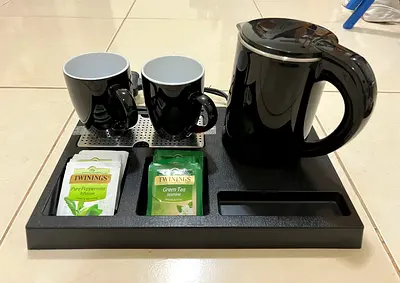 Elegant Tea Set with Kettle and Cups