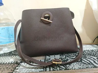 Elegant Brown Crossbody Bag. Original price 200