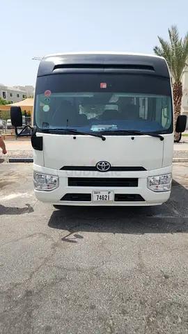 Toyota Coaster with Driver