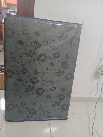 Foldable medicated mattress