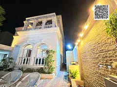 Villa for sale in Ajman, Al Rawda 1 area, behind Al Hamidiya Police Station. Second plot from Riyadh
