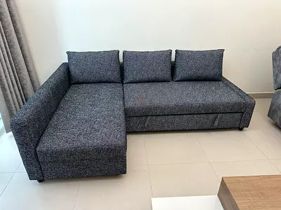 Ikea friheten L-shape sofa bed with storage black and white