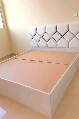 Elegant White Bed with Stylish Headboard