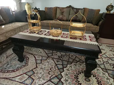 Elegant Coffee Table with Intricate Details and 2 Side Tables