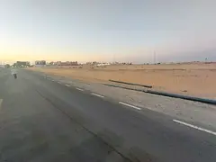 Two adjacent plots of land for sale in Al Sajaa Industrial Area
