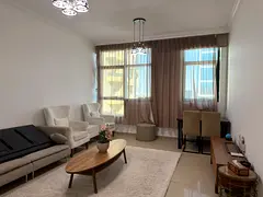 FOR RENT FURNISHED 1 BEDROOM AND HALL IN AL RASHIDYAH TOWER