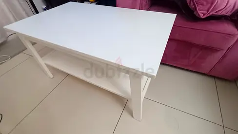 Sleek White IKEA Coffee Table with Lower Shelf