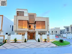 A luxurious villa with a modern design and high-end finishes, featuring a garden, private pool, elev