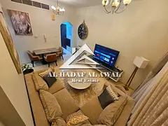 For monthly rent in Al Majaz 3, one bedroom and a hall with free internet