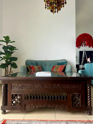 Unique Vintage Coffee Table with Intricate Carvings